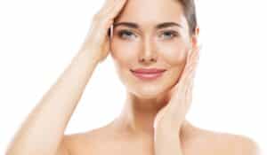 A woman smiling after facial fat grafting in Chicago