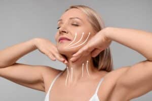 A woman touching her jaw after Ellacor® in Chicago, IL