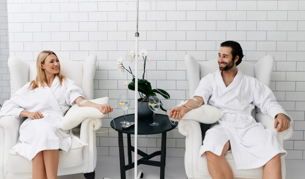 Man and woman getting IV therapy for hydration in Chicago